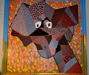 Tête de chien sur cou de girafe