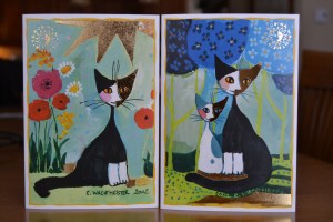 J'ai acheté ces deux cartes qui regroupent trois chats.